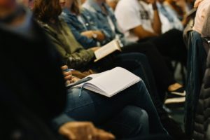 audience taking notes